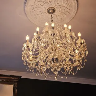 a chandelier hanging from the ceiling