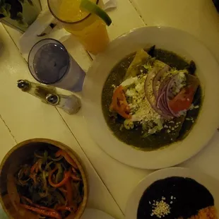 steak fajita bowl and steak enchiladas, plus two sides of rice and beans