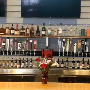 a bar with many bottles of alcohol