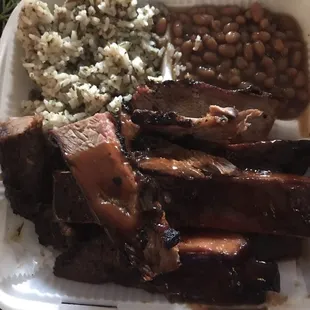 The food is always on point. 2 meat plate with Brisket , Ribs , Dirty Rice &amp; Baked Beans