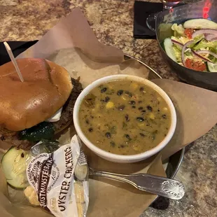 a bowl of soup and a sandwich