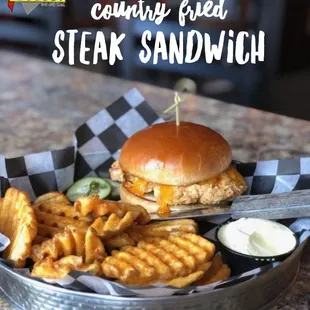 Weekly Feature
Country fried steak sandwich with andouille sausage gravy and cheddar cheese.