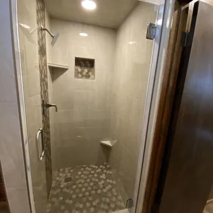 New shower and shower door with bronze glass