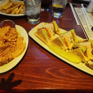 Club sandwich and fries