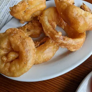 Onion rings for the extra charge that I got 2+ weeks ago. The onion rings from 7/27 were very brown and only 3 on plate.