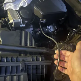 A random loose wire just dangling CONNECTED TO my engine??? Lol what in the world, I payed $4000 for this type of "professional service" ???