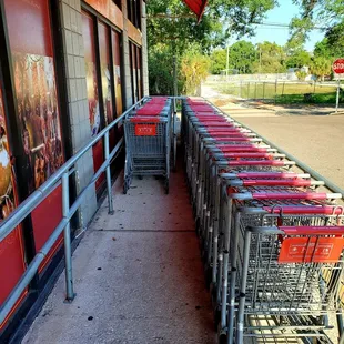 April 2021: The handheld baskets are located inside the store