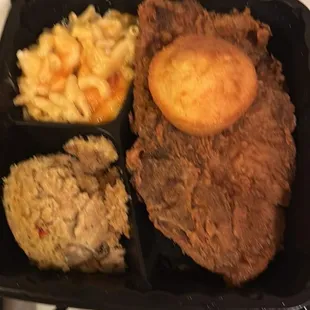 Fried pork chops, mac &amp; cheese ,cornbread dressing and muffin...