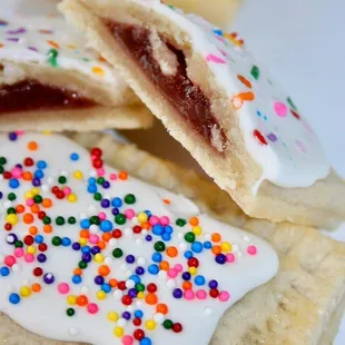 a close up of a pastry with sprinkles