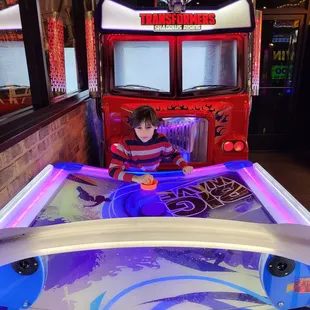 AJ playing his game and waiting on pizza.