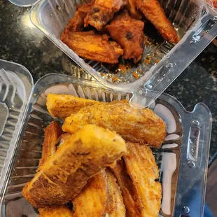 Chicken wings and potato wedges