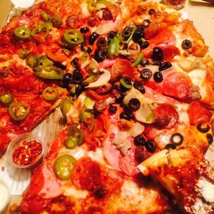 Half meat lovers half combination with jalapeños