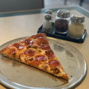 Slice of pepperoni and sausage always feeds the soul.  $4 slice is a damn deal