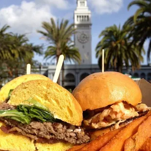 two sandwiches and french fries