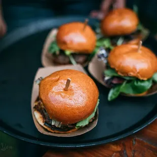 Me So Hungry (Too) sliders being served at our wedding. Photo by Wild About You Photography