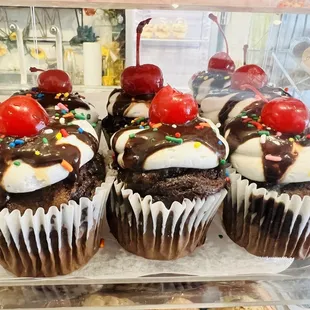 a display of cupcakes