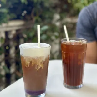 Blueberry cold brew with coconut foam and a black cold brew