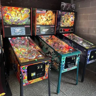 a row of pinball machines