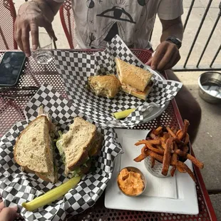 Sweet Potato Fries, 6th street sandwich, and Hell&apos;s Kitchen sandwich