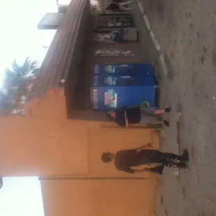 a man standing in front of a store