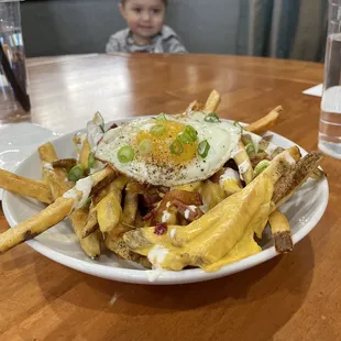 Bacon, egg and cheese fries