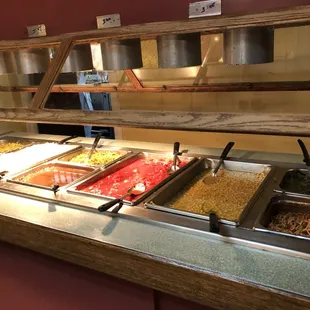 a buffet with a variety of food items