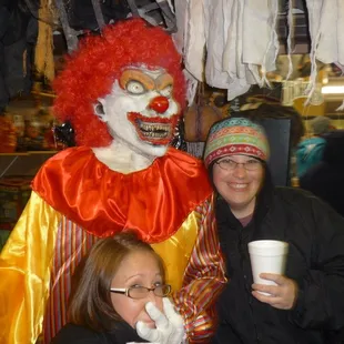 a woman and a woman dressed as a clown