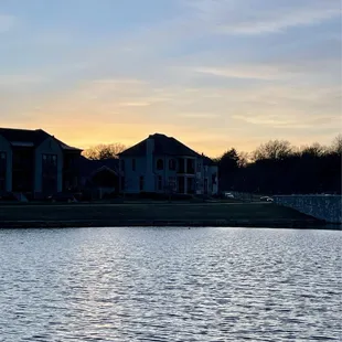 View of the setting sun from around the lake's walking trail