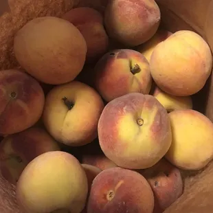 picking up 10lbs of peaches for canning! (2 paper bags, half full, are about 10lbs)