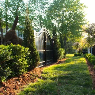 Gated garden with moss rabbit.