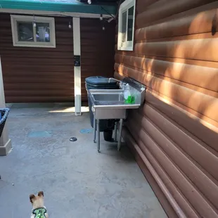 A place to clean your BBQ equipment, plates, etc..