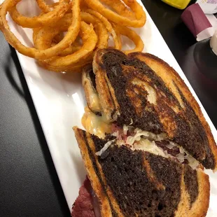 Reuben sandwich and onion rings