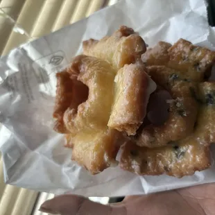 glazed old fashioned donut and a blueberry old fashioned donut.