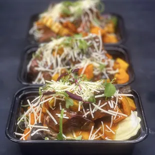 a variety of food items in plastic containers