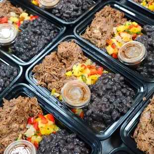 Birria Bowl- slowed cooked beef, mango salsa, black beans and a side of consume