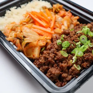 Korean Beef Bowl- marinated lean ground beef, kimchi and carrots with white rice