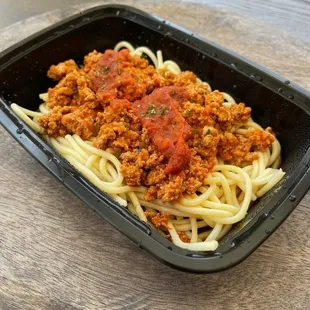a plate of spaghetti and meat sauce