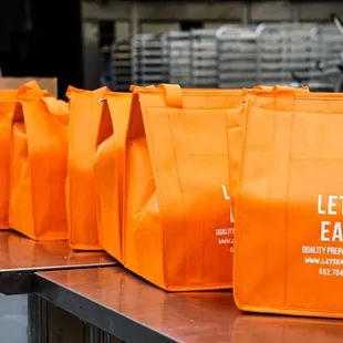 We delivery all over LA, OC, IE, and Riverside! To ensure safety transport of your meals, they're stored in insulated bags with cold packs.