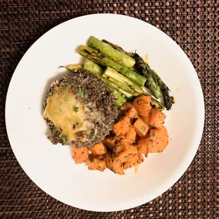 BLACK BEAN QUINOA CAKES / served with sweet potatoes and roasted asparagus