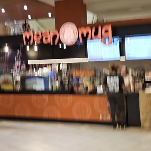 a blurry photo of a coffee shop
