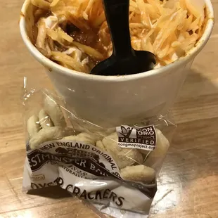 Chili with cheese and onions and oyster crackers.