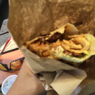 Breakfast Burrito With bacon s and avocado for $12.