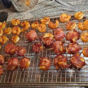 Shrimp and bacon wrapped shrimp with gospel.