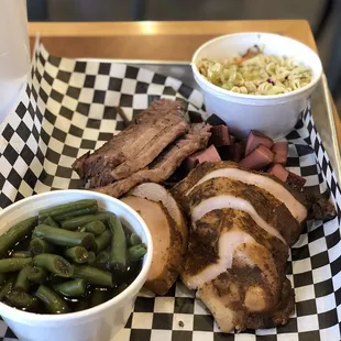 Cider coleslaw, smoked green beans, chicken, bologna, and brisket!! Delicious!