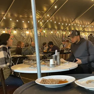 a man and a woman sitting at a table