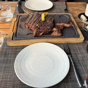 32oz Tomahawk Steak and a side of Scalloped Potatoes and Goat Cheese