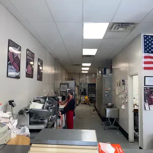 a woman working in a commercial kitchen