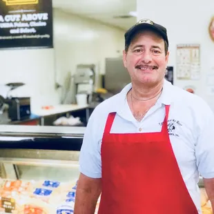 a man in a red apron