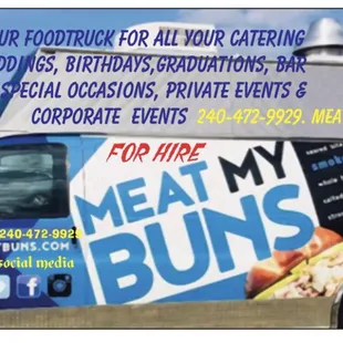 a delivery truck with a sign for meat my buns