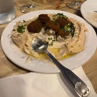 Falafel that floats like the heavens, hummus and tahini that are like the finest silks.